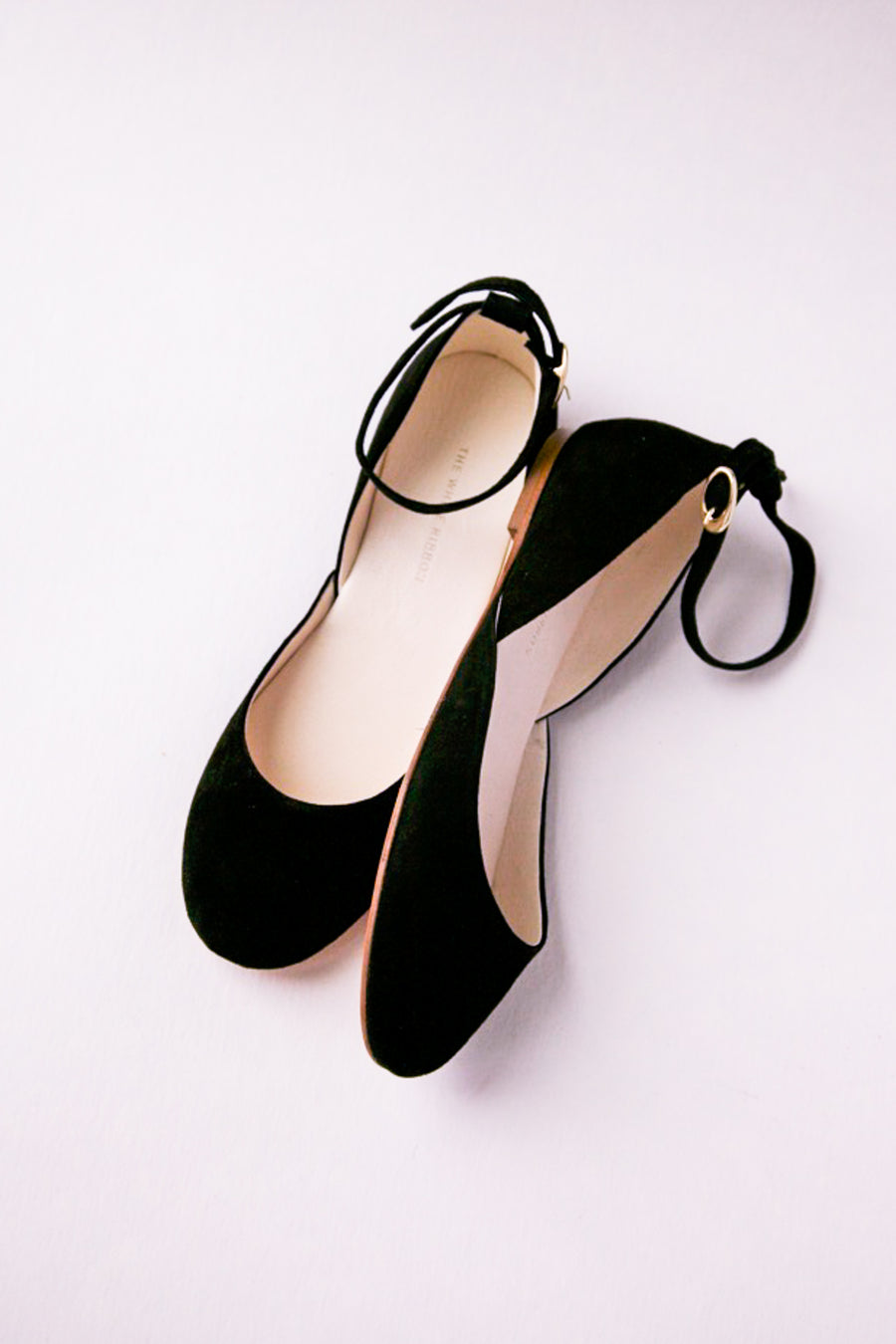 black ballet flats in nubuck from top view