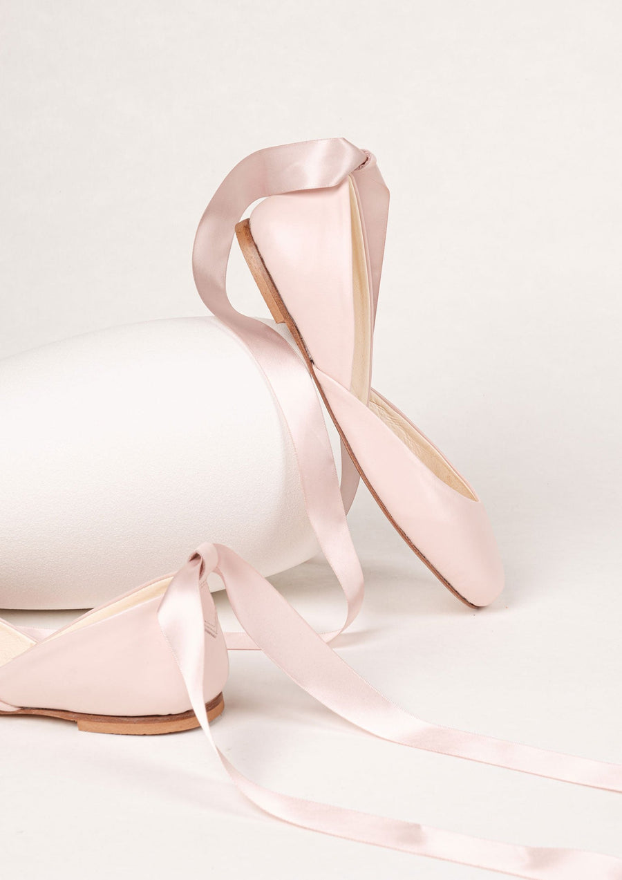 blush satin ballet flats from side view