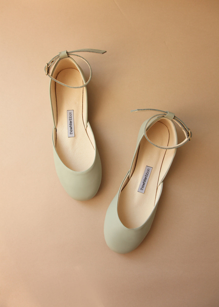 light mint shade soft leather ballerinas with ankle straps from top front shot