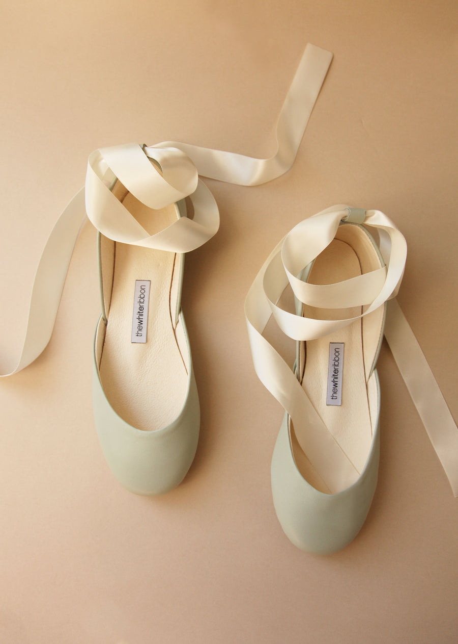 light mint shaded leather ballet flats with satin ankle straps shown from top
