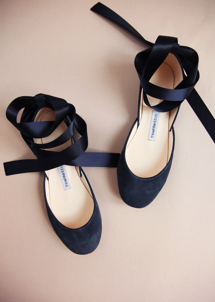 soft leather ballet flats in navy blue shade with satin straps from top