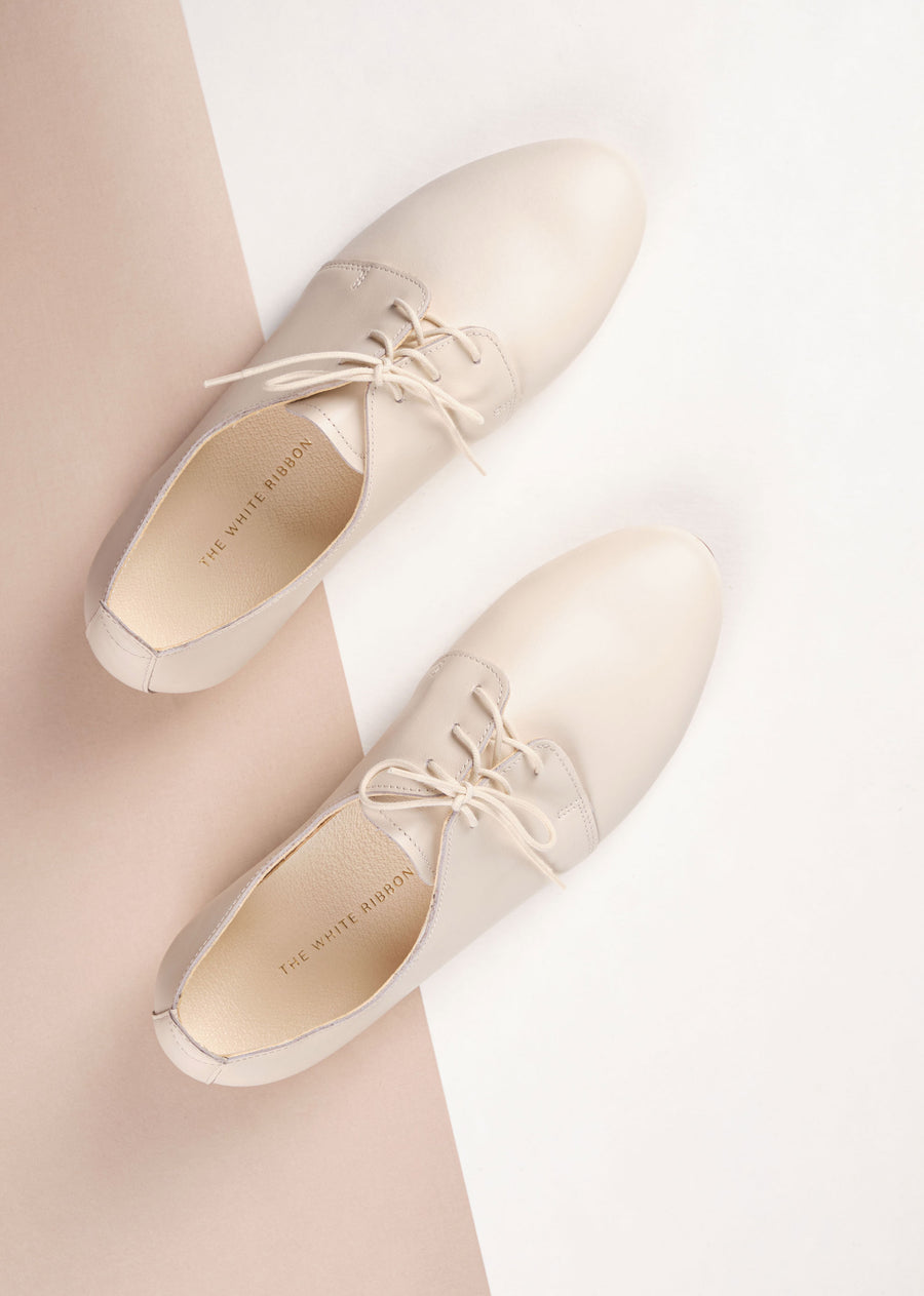 Bridal flat leather shoes in ivory from top view