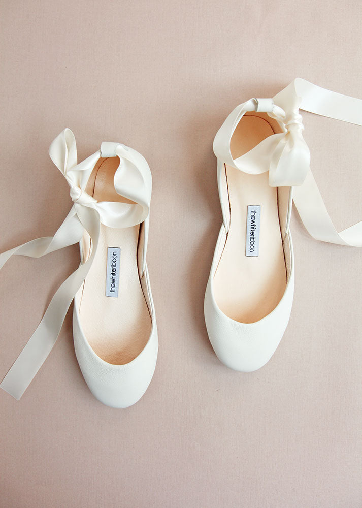 Ivory bridal ballet flats, top view