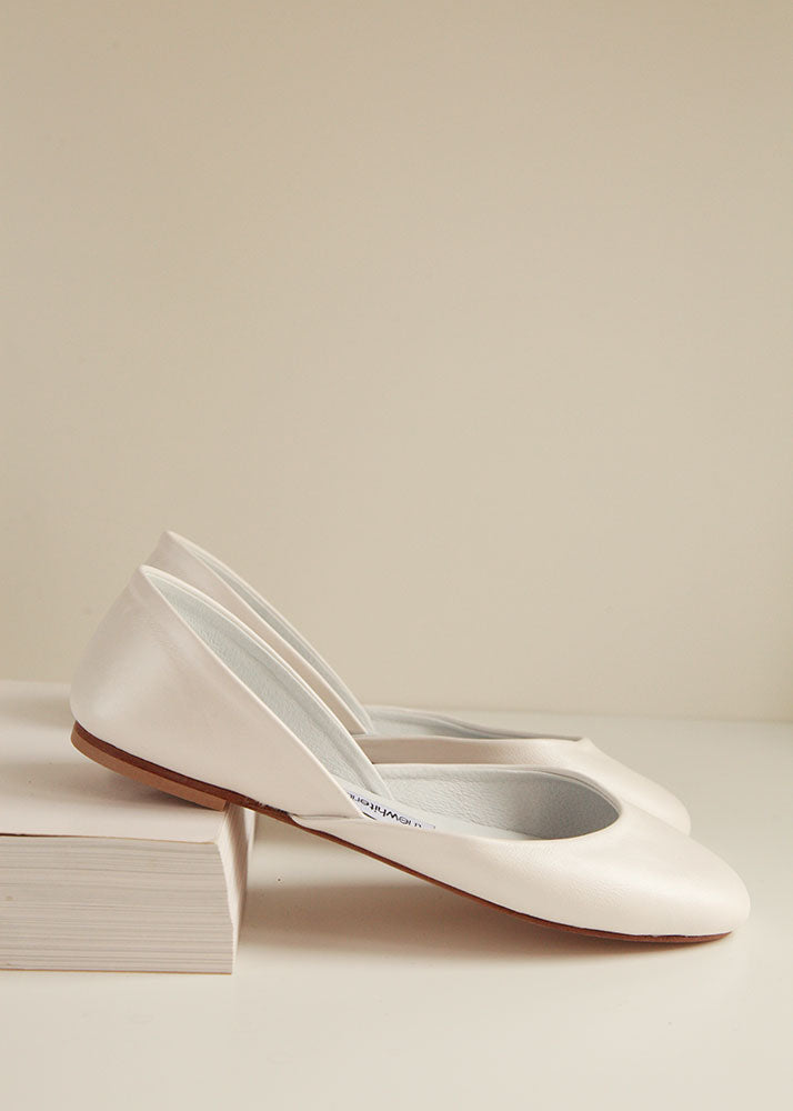 shimmering peral ivory smooth leather ballet flats in side view
